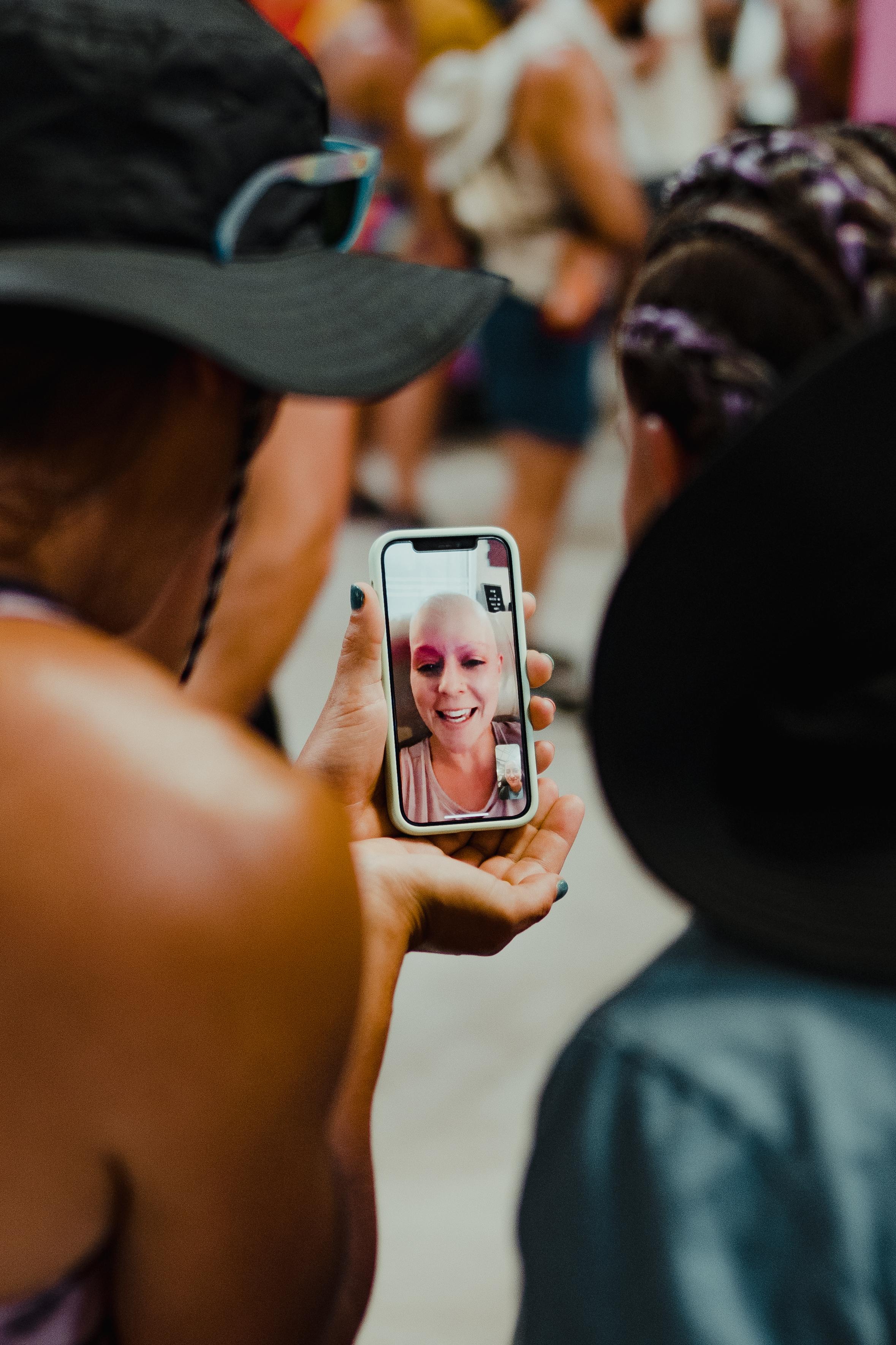 Participants on a video call with a cancer survivor